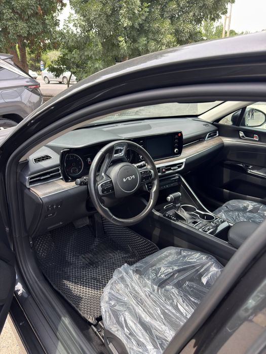 KIA k5 prestej pozitsiya