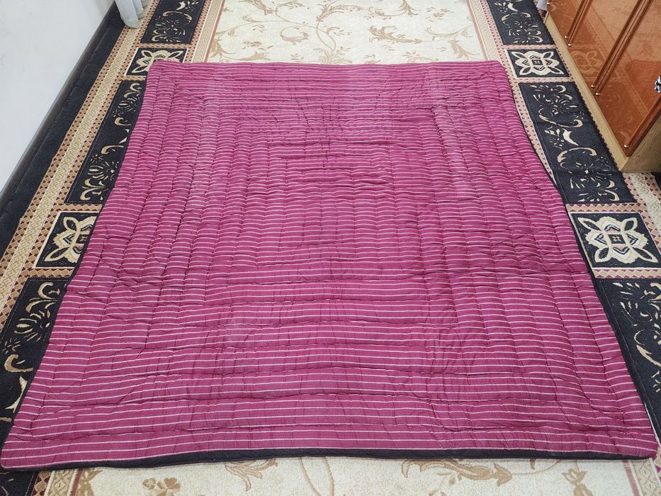 Духоба курпа тахвонда турган