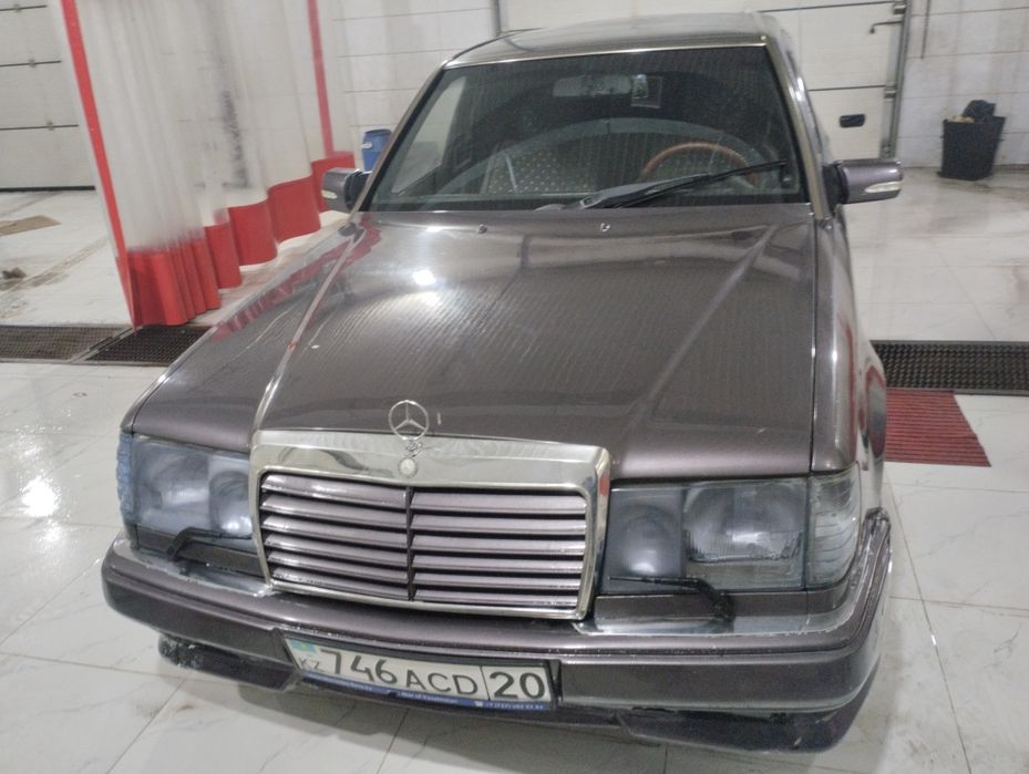 Мерседес Бенс 124