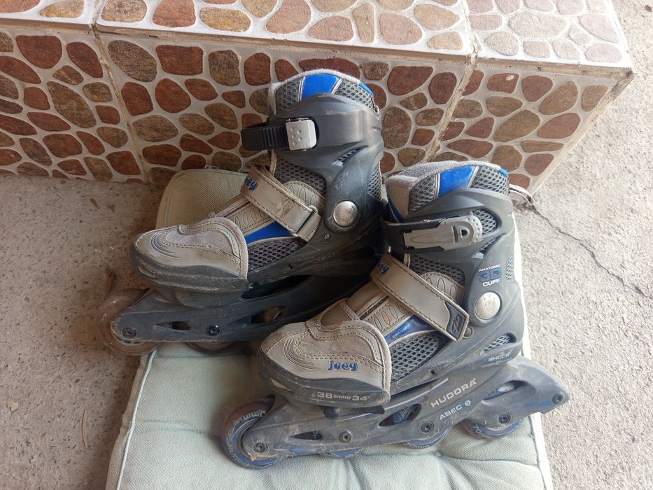 Роликовые коньки .