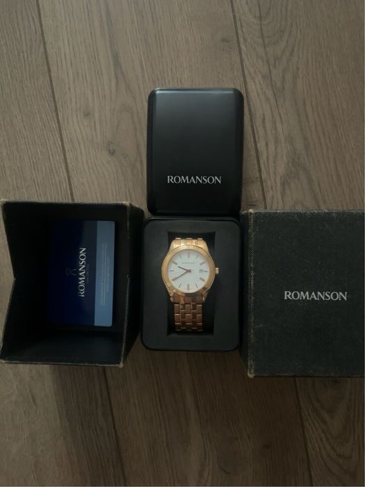 часы Romanson.