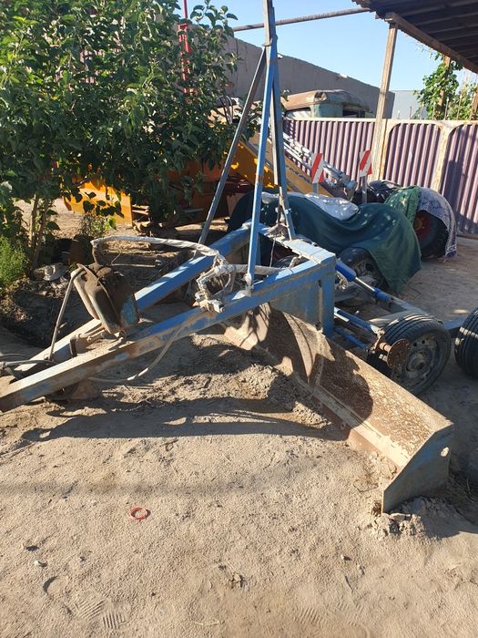 MTZ 80.1 lazerni yer tekislagichi bilan