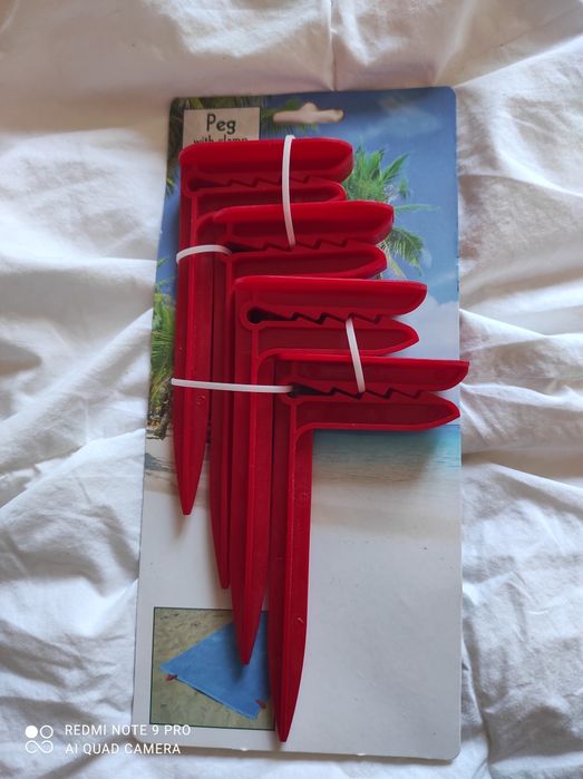 Щипки за плажна кърпа