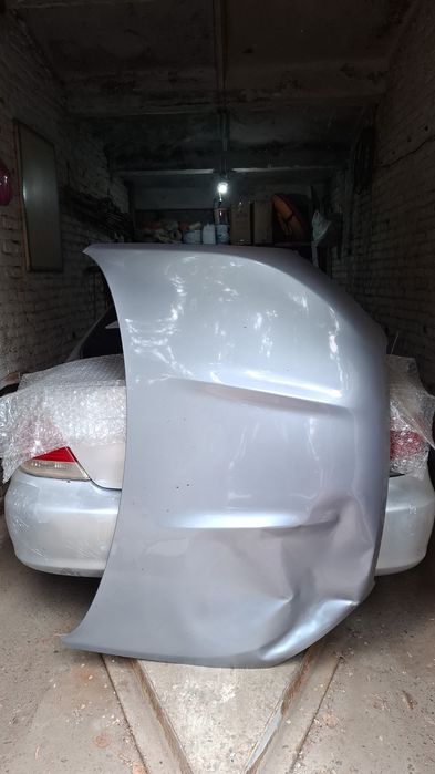 Капот автомобиль Nissan Qashqai