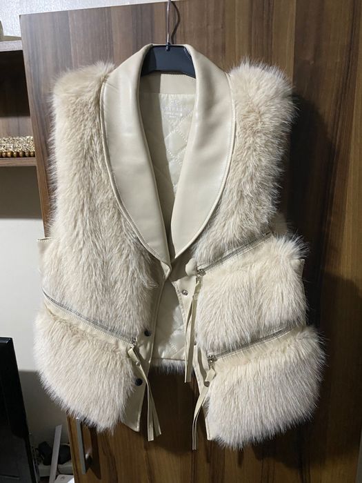 Дамски пухен елек