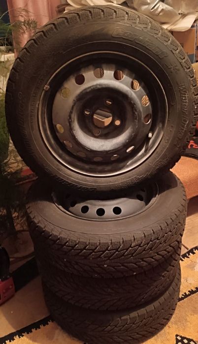 Продам 4 Покрышки с дисками 185/65 R14