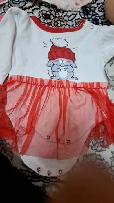 Новорождённого одежды на девочку
