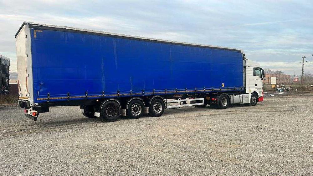 Semiremorca cu prelata Fruehauf