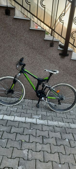 Vând bicicletă full suspension