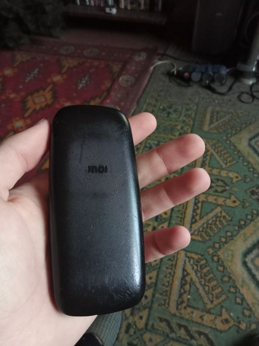 Кнопочный телефон