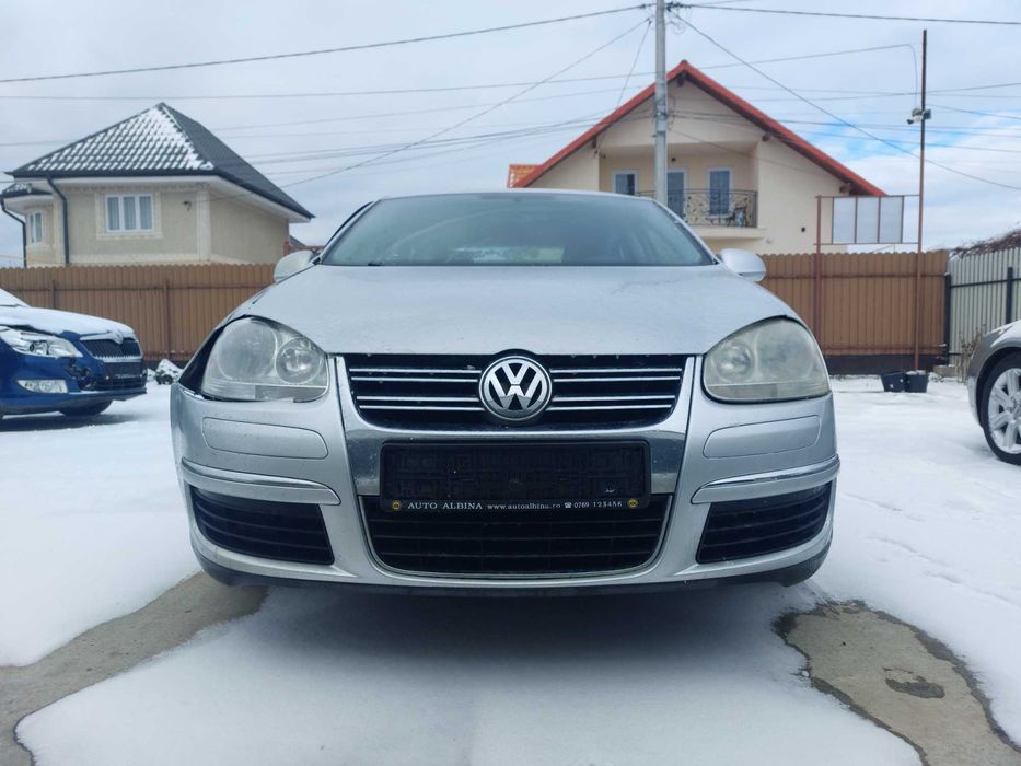 Portiere stanga - Orice piese volkswagen jetta motor 1.6 FSI BLF 6 tr