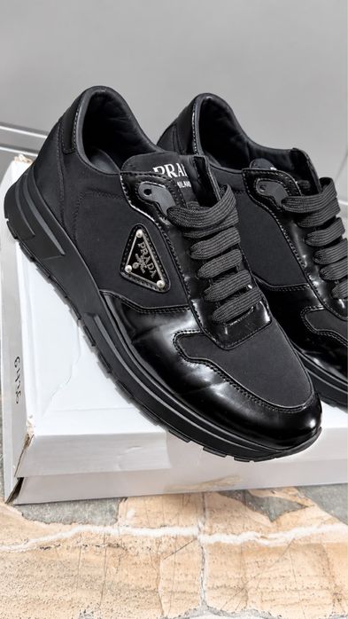 Кроссовки Prada женские