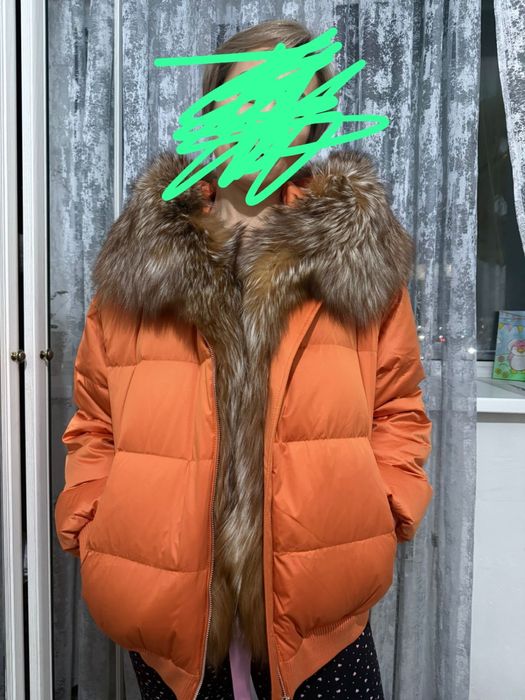 Продам пуховик..