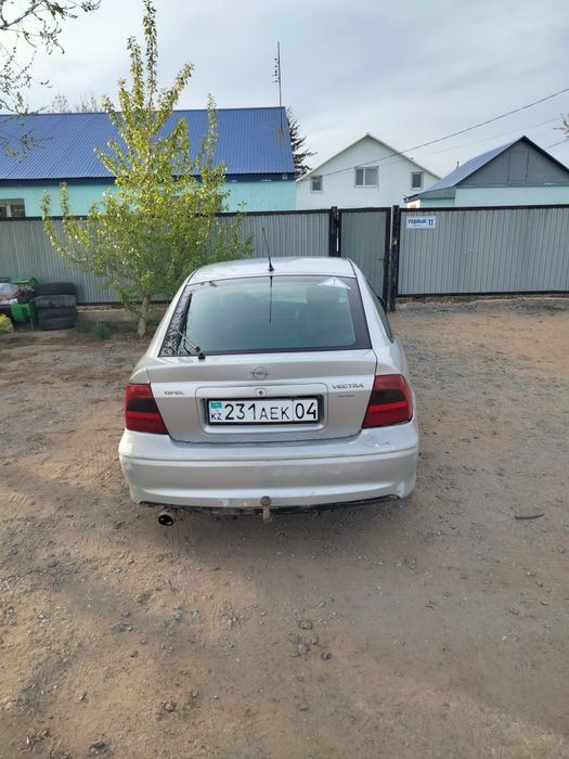 Автомобиль опель вектра