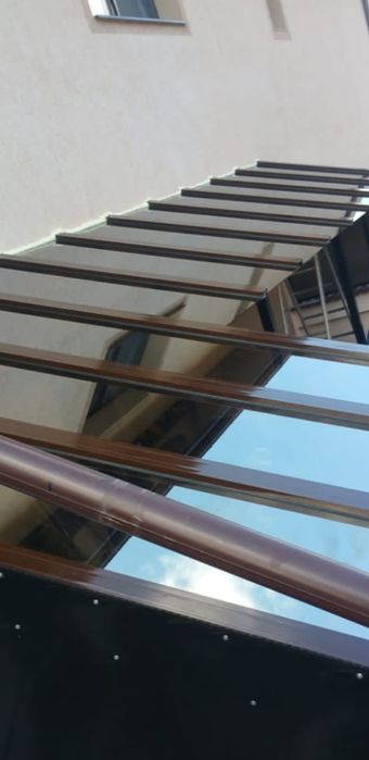 Wintergarten pergole terase cu acoperiș de sticlă și peretii glisanții