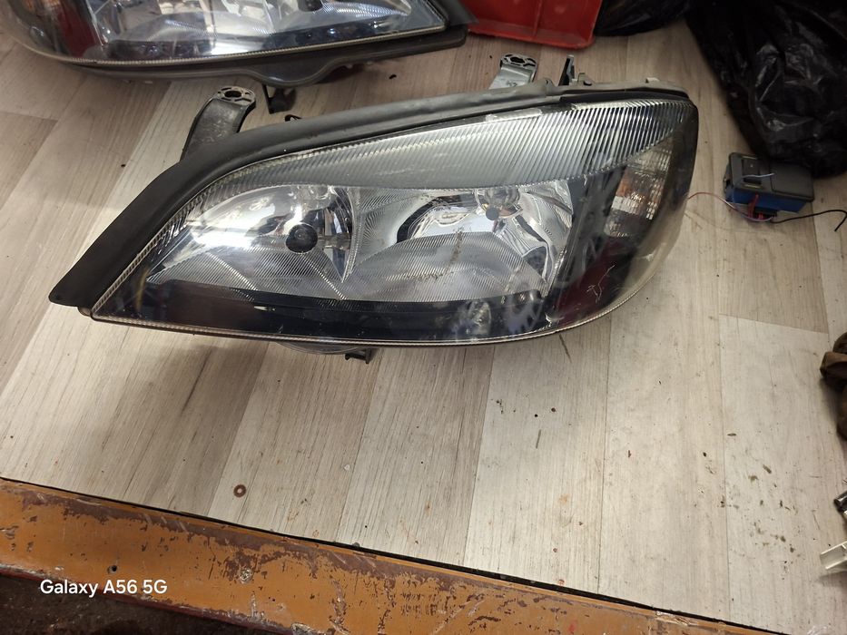 Оригинални фарове Opel Astra G