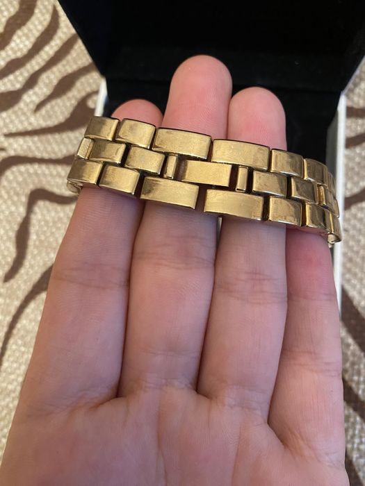 золотистые часы Dior