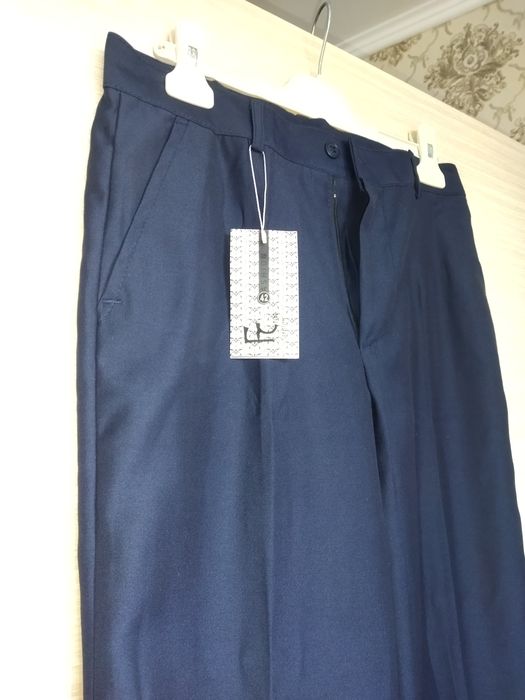 Новые школьные брюки 42 рр