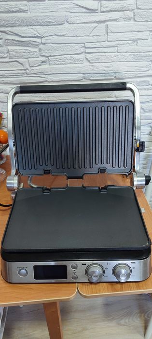 Продам электрогриль Delonghi