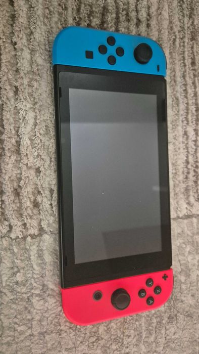 Nintendo Switch cu 3 jocuri