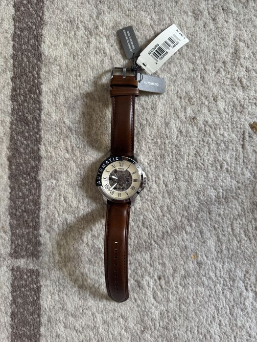 Ceas barbati nou fossil