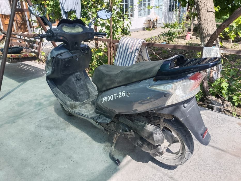 Скутер real moto