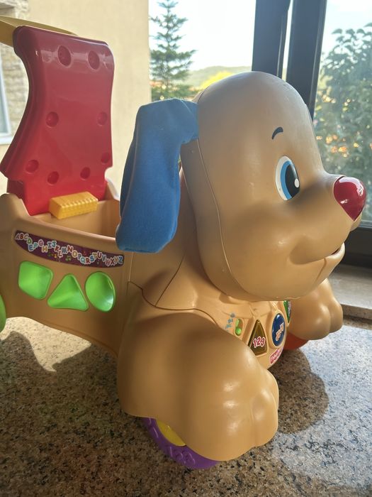 Premergător Fisher-Price Laugh & Learn Stride-to-Ride Puppy