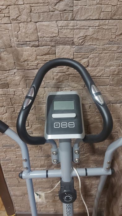 Продам элептический тренажер