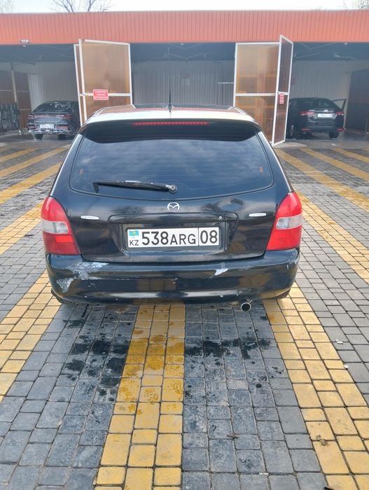 Мазда 323 находу