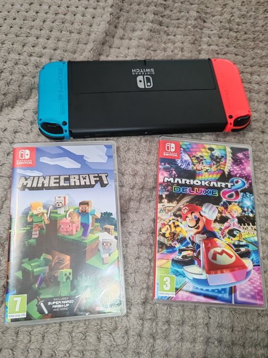 Nintendo switch cu gentuță si trei jocuri