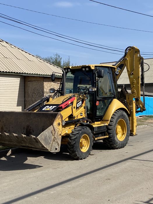Экскаватор-погрузчик, Ямобур, Гидромолот