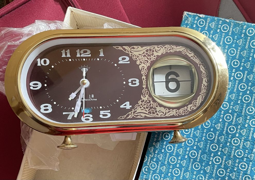Ceas mecanic, China, nou