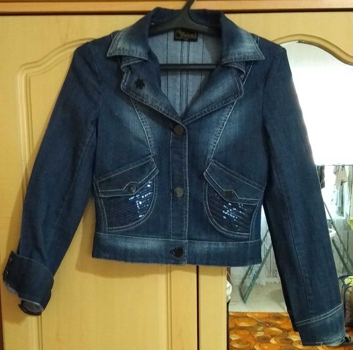 Джинсовая куртка на девочку от 9 до 13 лет фирмы Deloras