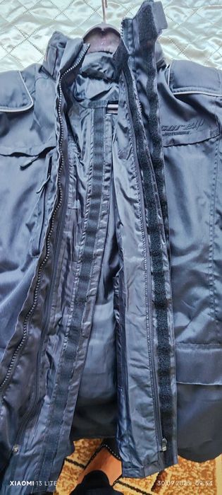 Текстилно мото яке ново  размер М.