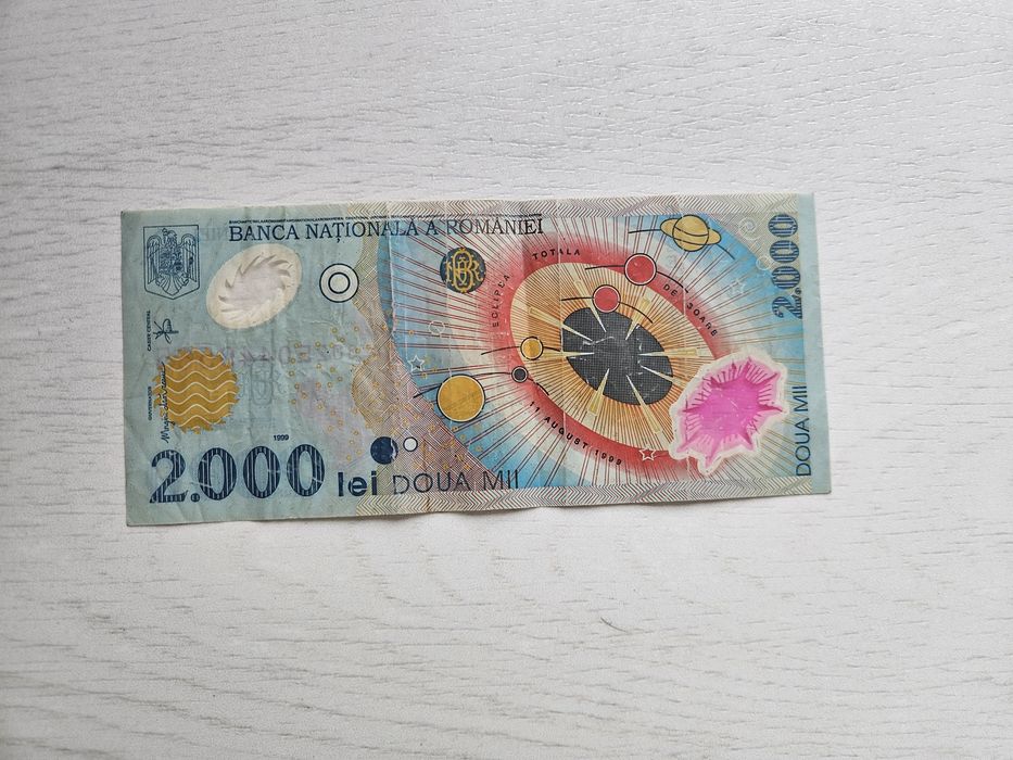 Vand bancnotă 2000 lei cu eclipsa 1999