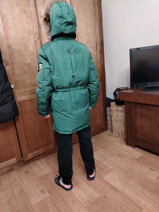 Продам пуховик зимний