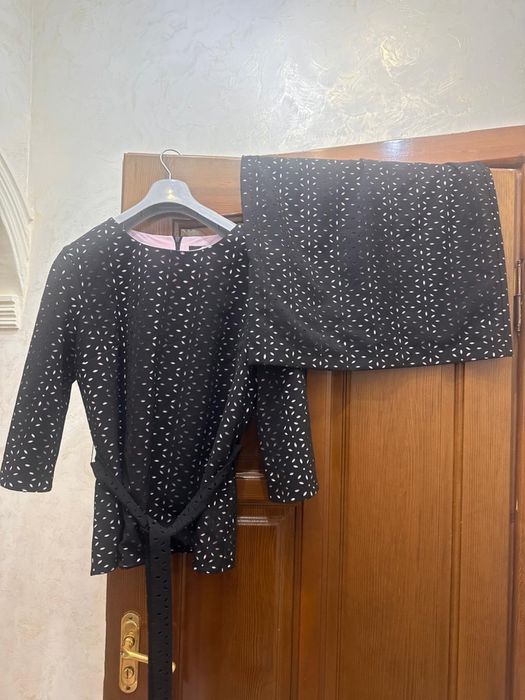 Продам юбочный костюм