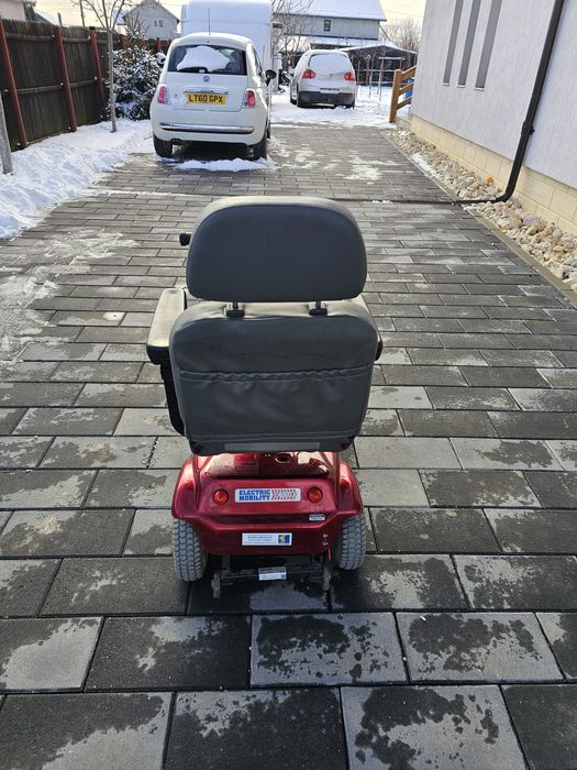 Scuter electric carut scaun persoana cu dizabilitati  Rascal
