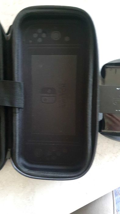 Nintendo switch  oled nou 2 folii , husa/1 joc