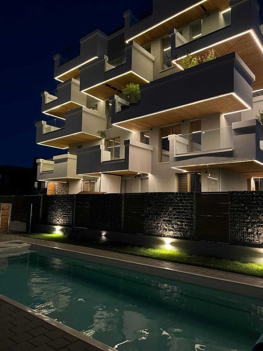 De închiriat – Apartament modern 3 camere, cu piscină și parcare