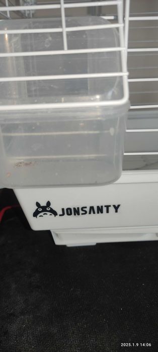 Фирменная клетка для попугаев.