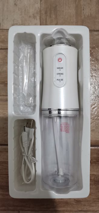 Irigator oral portabil (duș bucal).