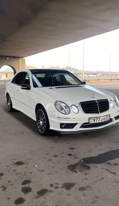 Бампер на Mercedes W211 (E-Class) в стиле AMG 63