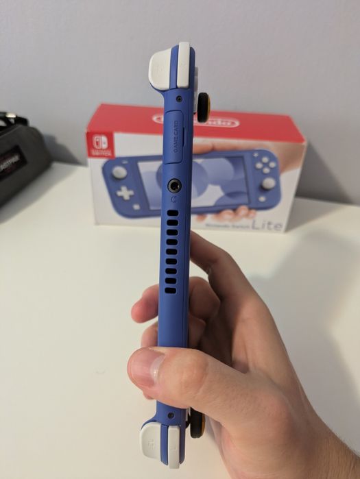 Nintendo switch lite ca nou + card Kingston 128gb