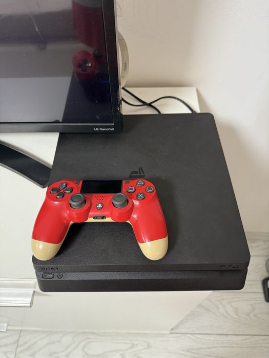 PlayStation 4 , 1 TB + peste 30 de jocuri incluse