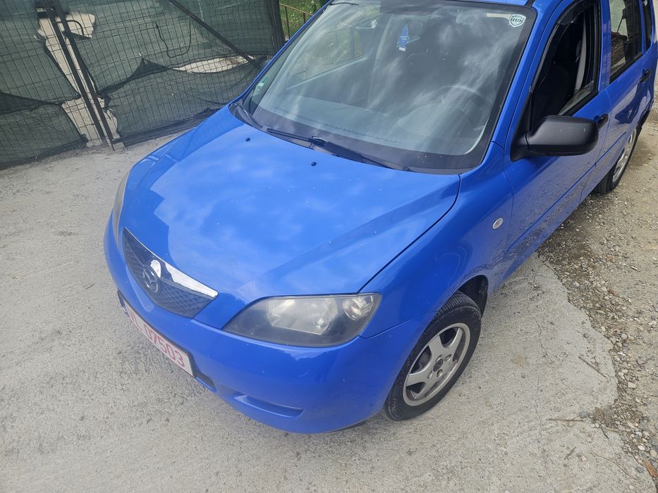 Capotă bară faruri Mazda 2