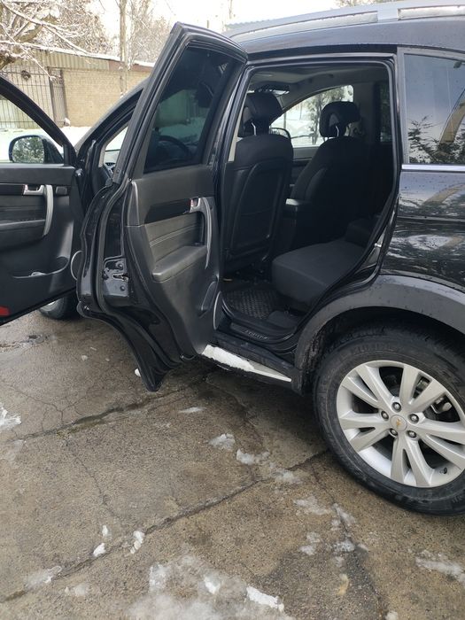 Captiva 2015 Y kraskasi toza xatto banferlayam toza benzinda avtomat .