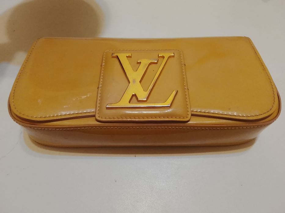 Louis Vuitton Sobe Clutch