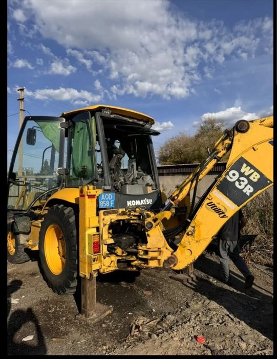 Услуги экскаватора-погрузчика