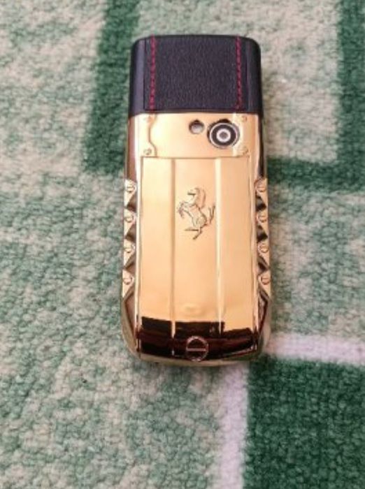 Мобилен телефон марка SERVO с две СИМ карти + кутия + зарядно + калъв